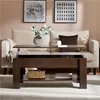 A living room scene with a couch and a coffee table. Produktbild-Vorschau