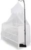 A white crib with a white mosquito net canopy and a black stand for the canopy. Anteprima dell’immagine prodotto