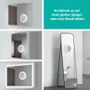 A collage of images showing a round LED makeup mirror attached to different mirror surfaces and a freestanding mirror. Produktbild-Vorschau