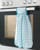 A checkered towel hanging on an oven handle. Produktbild-Vorschau