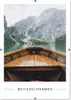 View from inside a wooden boat looking out at a lake and mountains. Produktbild-Vorschau