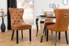 A dining room scene with a table and chairs. Produktbild-Vorschau
