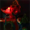 A close-up shot of a magnetic ball run toy with a doll peeking out. Náhled obrázku produktu