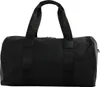 A black duffel bag with black straps against a white background. Produktbild-Vorschau