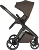 A side view of a brown stroller against a white background. Náhled obrázku produktu