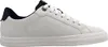 A side view of a white sneaker with navy accents. Podgląd zdjęcia produktu