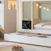 A child's bed with storage drawers and decorative elements. Produktbild-Vorschau