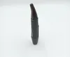 A black and brown precision trimmer is shown against a white background. Podgląd zdjęcia produktu