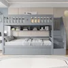A gray bunk bed with storage shelves and stairs in a bedroom. Náhled obrázku produktu