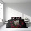 A bedroom scene with a bed dressed in a duvet cover set featuring a sugar skull and rose design. Produktbild-Vorschau