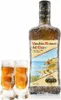 A bottle of liqueur and two shot glasses filled with the liqueur, all covered in frost. Produktbild-Vorschau