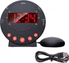 A black digital alarm clock with red LED display and a vibrating puck accessory is shown. Náhľad obrázku produktu