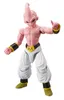 A full-body shot of a pink action figure with a pointed head, wearing white pants and yellow shoes. Anteprima dell’immagine prodotto