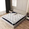 A mattress topper is placed on a bed in a bedroom setting. Náhľad obrázku produktu