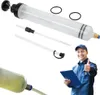 A person in a uniform is giving a thumbs up next to a fluid syringe and its accessories. Produktbild-Vorschau