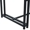 A close-up view of the black metal legs and base of a table. Anteprima dell’immagine prodotto