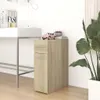 A narrow wooden cabinet with two drawers is placed next to a white desk. A pink toy car and a small potted plant sit on top of the cabinet. Anteprima dell’immagine prodotto