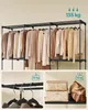 A clothing rack with clothes hanging on it, and close-ups of hanging clothes and storage boxes. Produktbild-Vorschau