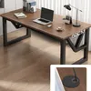A modern desk setup with a laptop, lamp, and books. Náhľad obrázku produktu