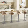 Four bar stools are arranged in a kitchen or dining area. Náhľad obrázku produktu