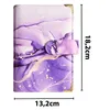 A binder notebook with a purple marble design and gold accents, shown with dimensions indicated. Voir les images du produit