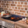 A kitchen counter with a stovetop and backsplash. Náhľad obrázku produktu