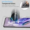 A close-up demonstration of a tempered glass screen protector on a smartphone, showing its protective qualities against impact and scratches. Produktbild-Vorschau