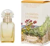 A perfume bottle and its packaging are displayed side-by-side. Náhled obrázku produktu