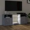 A TV stand with a TV on top, in a living room setting. Anteprima dell’immagine prodotto