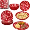 A collage of Christmas-themed red and white dinnerware, including plates, bowls, and a plate with food. Produktbild-Vorschau
