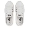 A top-down view of a pair of white Lee Cooper sneakers. Voir les images du produit