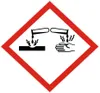 A hazard symbol indicating corrosive substances. Voir les images du produit