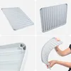 Collage of a light gray dish drying mat shown from different angles and a close-up of its texture. Podgląd zdjęcia produktu