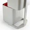 A close-up view of a gray recycling bin with a red inner bin, set against a white background. Podgląd zdjęcia produktu