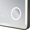 A close-up view of a modern LED bathroom mirror with a built-in digital clock and a circular illuminated magnifying mirror. Náhled obrázku produktu
