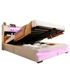 A bed with its storage compartment open, revealing bedding and showing LED lighting. Voir les images du produit