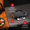 A waffle maker is shown on a countertop with descriptive text and icons highlighting its features. Produktbild-Vorschau