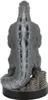 A rear view of a Godzilla figurine sitting on a city base. Produktbild-Vorschau