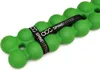 A green spine massager with a black strap around it, on a white background. Anteprima dell’immagine prodotto