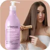 A woman is shown with long brown hair, with a bottle of Arkemusa Keratin Regenerating Conditioner in the foreground and a wooden comb in her hair. Náhled obrázku produktu