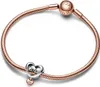 A rose gold Pandora bracelet with a heart-shaped charm that says "Love You Sister". Podgląd zdjęcia produktu