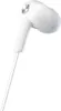 A close-up shot of a white in-ear headphone. Produktbild-Vorschau