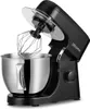 A black kitchen mixer with a silver bowl and whisk is shown from a side-angle. Náhled obrázku produktu