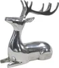A polished silver aluminum sculpture of a reclining deer with antlers, isolated on a white background. Produktbild-Vorschau