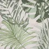 A close-up of a fabric with a tropical leaf pattern. Produktbild-Vorschau