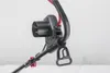 Close-up of the handle and power connection of an electric lawnmower. Produktbild-Vorschau