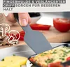 A hand is holding a gray spatula over a raclette dish with food. Produktbild-Vorschau