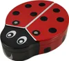 A ladybug-shaped tin box. Produktbild-Vorschau