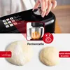 A kitchen appliance is shown with a close-up of its control panel and bowl, alongside two balls of dough. The appliance is likely a bread maker or stand mixer. Voir les images du produit