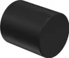 A black cylindrical object, likely a curtain rod end cap, is shown against a gray background. Produktbild-Vorschau
